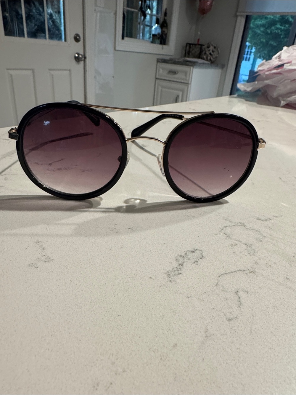 BCBGeneration Black Frame Sunglasses with Purple Gradient Lenses